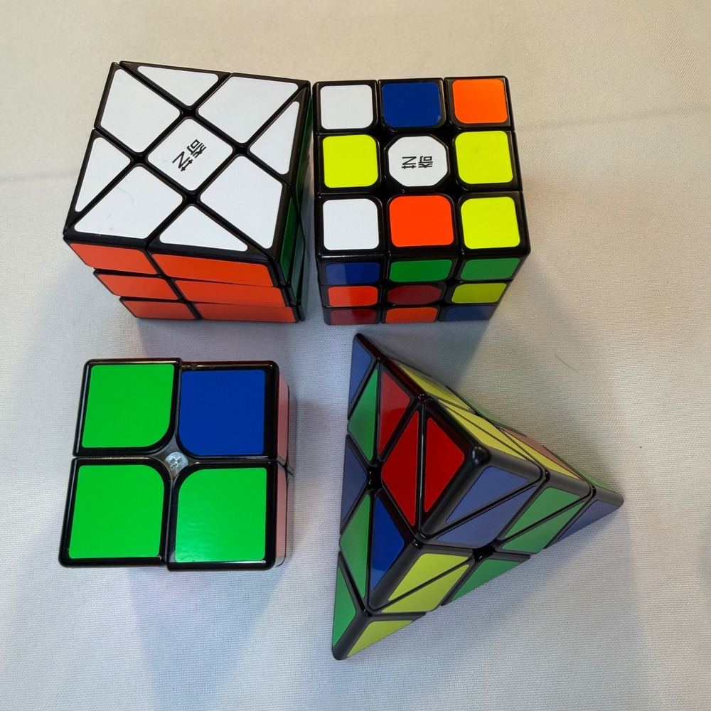 QiYi Speed Cube Bundle 4 Pack 2x2 3x3 Pyraminx Skewb Black Sticker Puzzles